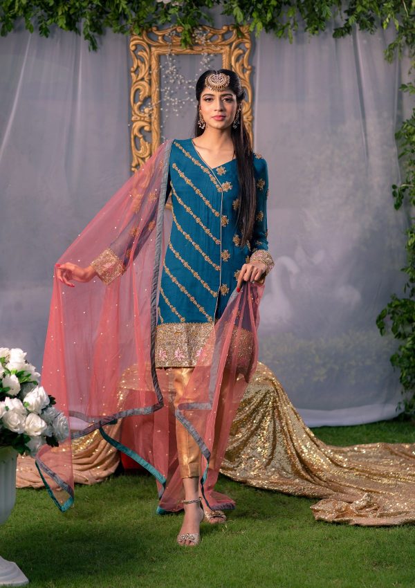 Teal green short gold embellished shirt with angrakha style cutline on chiffon fabric paired with gold pants and contrasting net dopata with a bit spray on it.