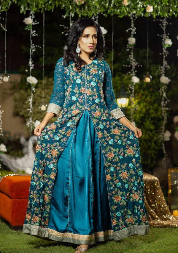 Heavily embroidered front open net jacket with fully handwork of tilla, threads, naqshi dapka and stoneswork on it. Lower panelled gown is of plain silk fabric with same color as well.